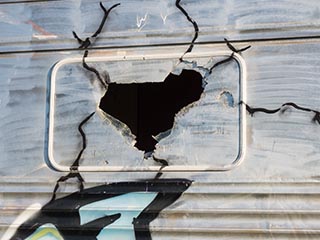 broken window of railway carriage, Port Pirie, South Australia