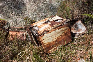 Rusty old icebox in the bush near Wondabyne, Australia
