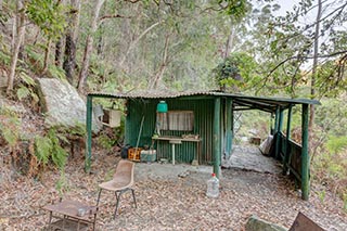 Old shack in the bush near Wondabyne, Australia