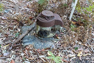 Old lawnmower dumped in the bush near Wondabyne, Australia