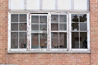 Broken windows of St. John's Orphanage