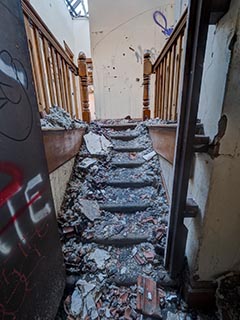 Fire damaged stairs in St. John's Orphanage