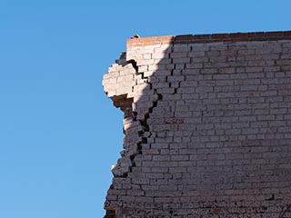 Partially collapsed wall