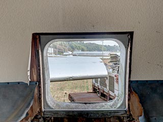 Broken window of Convair 240