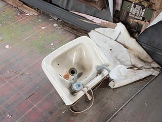 Old sink on cabin floor in Convair 240