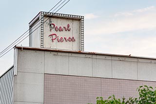 Love Hotel Pearl Pierce Sign