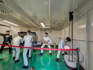 Recreation of crew loading 6 inch gun on Battleship Mikasa
