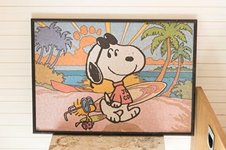 Framed Snoopy jigsaw puzzle in abandoned Japanese house
