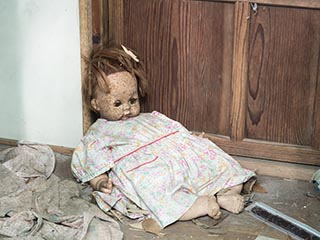 Doll in abandoned Japanese house