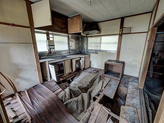 Abandoned kitchen with collapsing floor