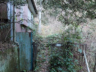 Gate by abandoned house, Kanagawa Prefecture, Japan