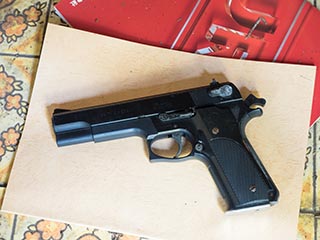 Smith & Wesson handgun in abandoned apartment