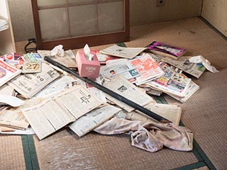 Newspapers in abandoned apartment