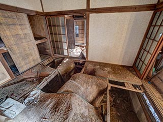 Collapsing floor in abandoned Japanese house