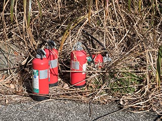 Fire extinguishers in courtyard of Hotel Gaia