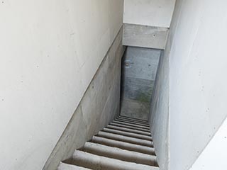 Stairs to tunnel below Hotel Gaia