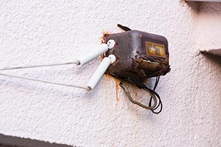 Rusting electrical equipment at Hotel Penguin Village