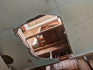 Hole in ceiling in manager's house of Hotel Penguin Village
