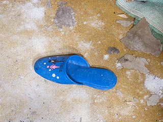 Toilet slipper on floor in Motel Akatsuki