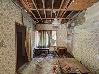 Guest room in Motel Akatsuki with collapsed ceiling