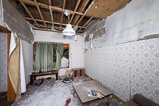 Guest room in Motel Akatsuki with collapsed ceiling