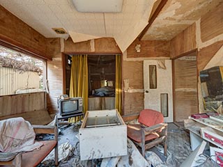 Filthy, decaying guest room at abandoned love hotel Century