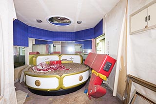 Abandoned Love Hotel Don Quixote Guest Room with Rotating Bed and Coin Operated Horse