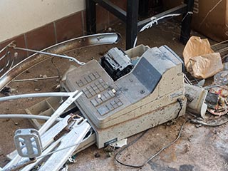 Broken cash register in abandoned Japanese Restaurant