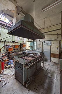 Gas Stove in Abandoned Restaurant Kitchen