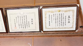 Framed Certificates in Abandoned Tamura Iron Manufacturing Waiting Room