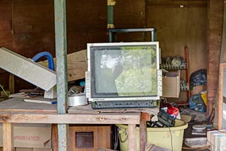 Old Television in Store Room of Abandoned Minshuku