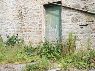 side door of abandoned house