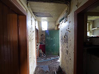rear hallway in abandoned house