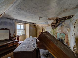 upstairs bedroom in abandoned house