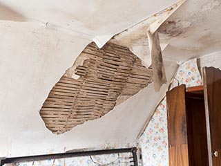 damaged lath and plaster ceiling