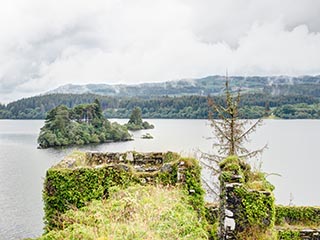 Islets in loch seen over ruined tower