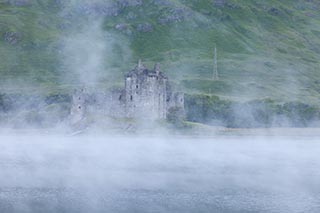 Kilchurn Castle by Loch Awe, Scotland, on a Misty Morning