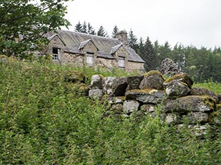 dry stone wall and ruined house