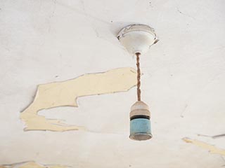 empty light socket in abandoned house