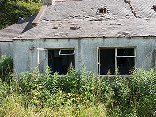 rear windows of abandoned house