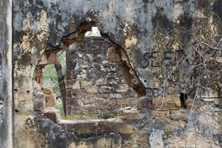 Hole in wall of Fretus Hotel