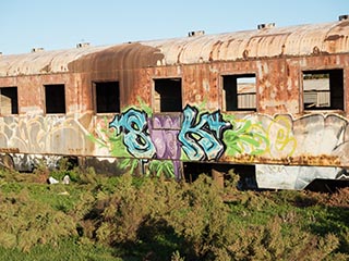 graffiti on abandoned railway carriage