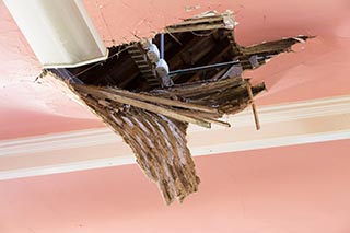 Hole in ceiling of St. John's Orphanage