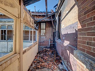 Fire damaged upstairs corridor in St. John's Orphanage