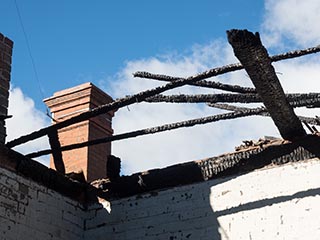 Charred roof joists of St. John's Orphanage