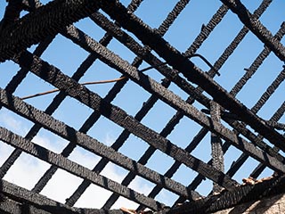 Charred roof joists of St. John's Orphanage