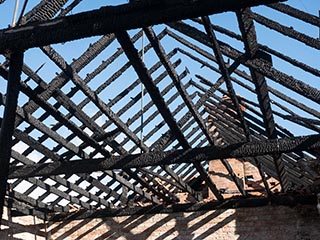 Charred roof joists of St. John's Orphanage