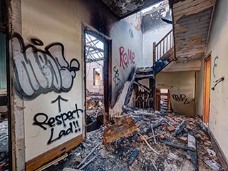 Fire damaged main staircase of St. John's Orphanage