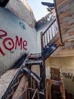 Fire damaged main staircase of St. John's Orphanage