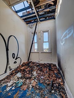 Fire damaged upstairs corridor in St. John's Orphanage